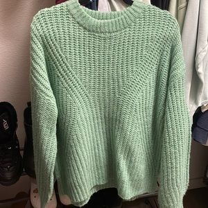 Green knitted sweater